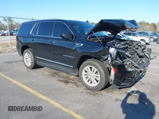 2021 GMC Yukon SLT with VIN 1GKS1BKD0MR199154, listed as a IAAI auction lot 41654239 with 105,357 mi miles. Bid and sale history available at carsss.com. Image 1.