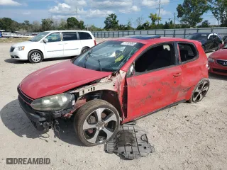 2012 Volkswagen GTI PZEV with VIN WVWED7AJ9CW150894, listed as a Copart auction lot 71702684 with 219,792 mi miles and Salvage Title. Bid and sale history available at carsss.com. Image 1.