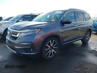 2019 Honda Pilot Touring 7-Passenger z VIN 5FNYF5H65KB020420, wystawiony jako IAAI lot #41575972 z przebiegiem 48 950 mil mil oraz . Historia ofert i sprzedaży dostępna na DreamBid. Obrazek 17.