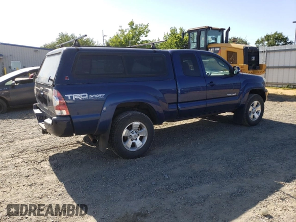 2014 Toyota Tacoma with VIN 5TFUU4EN4EX093945, listed as a Copart auction lot 58975405 with 111,695 mi miles and Salvage title. Bid and sale history available at DreamBid. Image 3.
