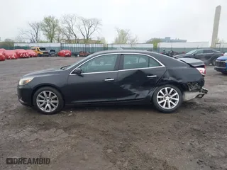 2013 Chevrolet Malibu LTZ with VIN 1G11H5SA7DF177897, listed as a IAAI auction lot 41984307 with 265,840 mi miles. Bid and sale history available at carsss.com. Image 13.