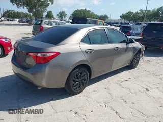 2019 Toyota Corolla L with VIN 5YFBURHE7KP878972, listed as a IAAI auction lot 42000888 with 201,612 mi miles. Bid and sale history available at carsss.com. Image 4.