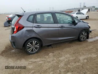 2015 Honda Fit EX-L z VIN 3HGGK5H85FM763929, wystawiony jako Copart lot #60808125 z przebiegiem 79 441 mil mil oraz Szkoda całkowita • Salvage title. Historia ofert i sprzedaży dostępna na DreamBid. Obrazek 3.