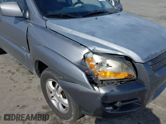 2005 Kia Sportage LX with VIN KNDJE723757102304, listed as a IAAI auction lot 41689073 with 125,276 mi miles and . Bid and sale history available at carsss.com. Image 6.