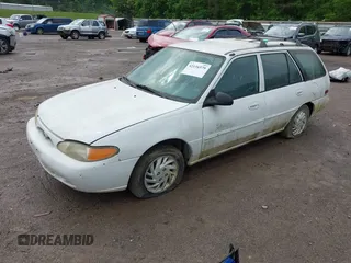 1999 Ford Escort SE with VIN 3FAFP15PXXR161344, listed as a IAAI auction lot 42116579 with 146,706 mi miles. Bid and sale history available at carsss.com. Image 2.