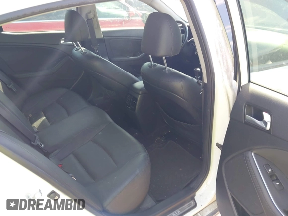 2015 Kia Optima EX with VIN KNAGN4AD6F5091809, listed as a IAAI auction lot 42257458 with 104,819 mi miles and . Bid and sale history available at DreamBid. Image 8.