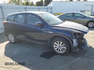 2015 Mazda CX-5 Sport with VIN JM3KE2BEXF0483141, listed as a Copart auction lot 59134105 with 71,727 mi miles and Salvage title. Bid and sale history available at DreamBid. Image 4.