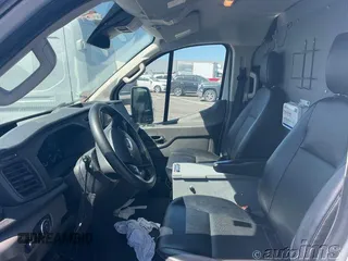 2020 Ford Transit Cargo z VIN 1FTBR1Y81LKB76529, wystawiony jako IAAI lot #42835283 z przebiegiem 131 910 mil mil oraz . Historia ofert i sprzedaży dostępna na DreamBid. Obrazek 7.