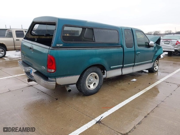 1998 Ford F-150 Standard with VIN 1FTZX1761WKA34173, listed as a IAAI auction lot 41710938 with NaN miles. Bid and sale history available at carsss.com. Image 4.