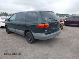 2000 Toyota Sienna CE with VIN 4T3ZF19C7YU240601, listed as a IAAI auction lot 41709617 with 999,999 mi miles. Bid and sale history available at carsss.com. Image 3.