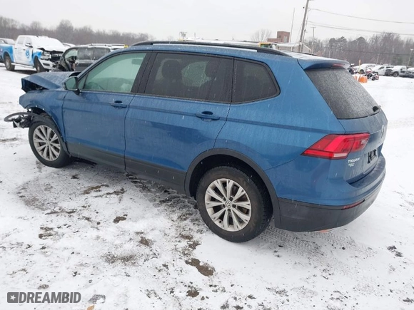 2018 Volkswagen Tiguan S with VIN 3VV0B7AX8JM081263, listed as a IAAI auction lot 41245308 with 58,778 mi miles. Bid and sale history available at carsss.com. Image 3.