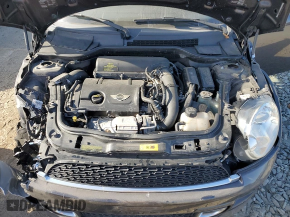2014 MINI Convertible S with VIN WMWZP3C55ET298172, listed as a Copart auction lot 76977114 with 119,138 mi miles and Salvage title. Bid and sale history available at DreamBid. Image 11.