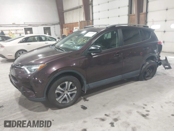 2018 Toyota RAV4 LE with VIN 2T3BFREV0JW759714, listed as a IAAI auction lot 41823084 with 119,909 mi miles and . Bid and sale history available at DreamBid. Image 21.