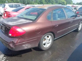 2000 Ford Taurus SES with VIN 1FAFP55S2YA259162, listed as a IAAI auction lot 42490655 with 220,347 mi miles and . Bid and sale history available at DreamBid. Image 4.