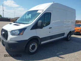 2023 Ford Transit Cargo with VIN 1FTBR1X80PKB45974, listed as a IAAI auction lot 42609404 with 35,940 mi miles and . Bid and sale history available at DreamBid. Image 18.