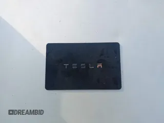 2023 Tesla Model Y Long Range with VIN 7SAYGDEE7PA196038, listed as a IAAI auction lot 41459601 with 16,489 mi miles and . Bid and sale history available at DreamBid. Image 11.