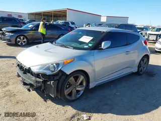 2013 Hyundai Veloster Turbo w/Black Int with VIN KMHTC6AE6DU162372, listed as a IAAI auction lot 41481820 with 105,650 mi miles. Bid and sale history available at carsss.com. Image 17.