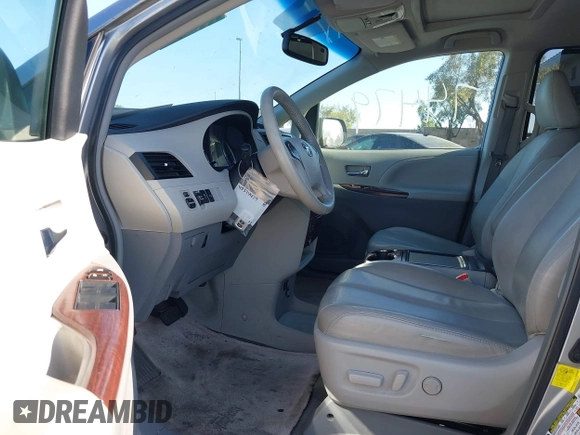 2013 Toyota Sienna XLE AAS with VIN 5TDYK3DC8DS318180, listed as a IAAI auction lot 42374479 with 189,977 mi miles and . Bid and sale history available at DreamBid. Image 5.
