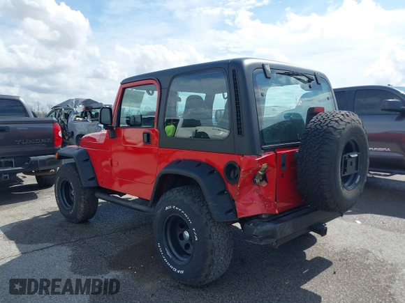 2002 Jeep Wrangler X with VIN 1J4FA39S02P739211, listed as a IAAI auction lot 41665910 with 144,118 mi miles. Bid and sale history available at carsss.com. Image 3.
