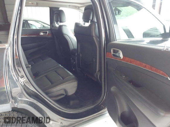 2012 Jeep Grand Cherokee Limited z VIN 1C4RJFBT1CC312006, wystawiony jako IAAI lot #42247170 z przebiegiem 233 890 mil mil oraz . Historia ofert i sprzedaży dostępna na DreamBid. Obrazek 8.