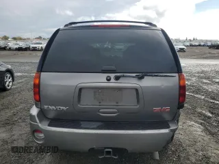 2005 GMC Envoy SLT with VIN 1GKDS13S852320018, listed as a Copart auction lot 80496544 with 237,451 mi miles and Salvage Title. Bid and sale history available at carsss.com. Image 6.