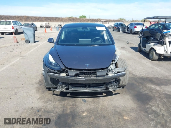 2023 Tesla Model 3 with VIN 5YJ3E1EAXPF652089, listed as a IAAI auction lot 42666520 with 17,679 mi miles and . Bid and sale history available at DreamBid. Image 20.