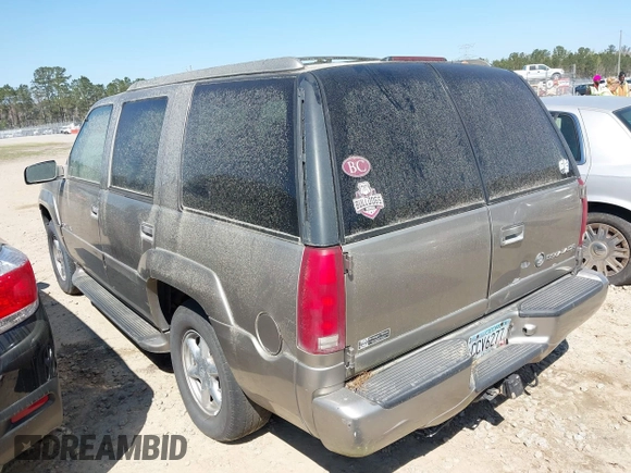 2000 Cadillac Escalade z VIN 1GYEK63R2YR209125, wystawiony jako IAAI lot #41854270 z przebiegiem 198 017 mil mil oraz . Historia ofert i sprzedaży dostępna na DreamBid. Obrazek 3.