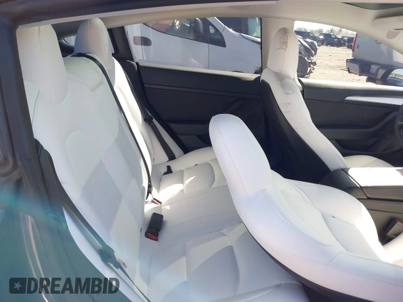 2022 Tesla Model 3 with VIN 5YJ3E1EAXNF326354, listed as a IAAI auction lot 41651872 with 27,922 mi miles and . Bid and sale history available at DreamBid. Image 8.