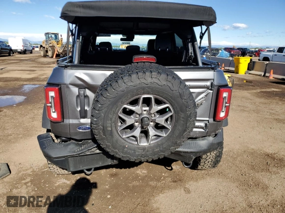 2023 Ford Bronco with VIN 1FMEE5DP0PLC10002, listed as a Copart auction lot 57272555 with 14,035 mi miles and Salvage title. Bid and sale history available at DreamBid. Image 6.