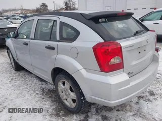 2007 Dodge Caliber SXT with VIN 1B3HB48B07D159549, listed as a IAAI auction lot 41330969 with 124,911 mi miles and . Bid and sale history available at DreamBid. Image 3.