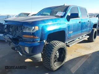 2017 Chevrolet Silverado 1500 LT with VIN 3GCUKREC8HG354004, listed as a IAAI auction lot 41429597 with 77,493 mi miles and . Bid and sale history available at DreamBid. Image 18.