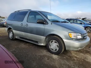 2000 Toyota Sienna LE with VIN 4T3ZF13C4YU209928, listed as a Copart auction lot 78900624 with 191,979 mi miles and Salvage Title. Bid and sale history available at carsss.com. Image 4.