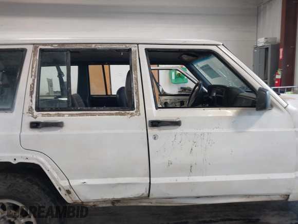 1997 Jeep Cherokee SE with VIN 1J4FJ28S1VL528218, listed as a IAAI auction lot 41931137 with 210,196 mi miles. Bid and sale history available at carsss.com. Image 12.