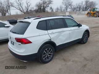 2021 Volkswagen Tiguan S z VIN 3VV0B7AX5MM071469, wystawiony jako IAAI lot #41716496 z przebiegiem 38 213 mil mil oraz . Historia ofert i sprzedaży dostępna na DreamBid. Obrazek 4.