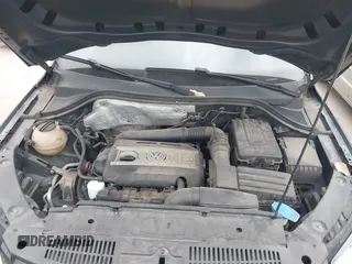 2012 Volkswagen Tiguan SE with VIN WVGAV7AX9CW611202, listed as a IAAI auction lot 41944210 with 118,002 mi miles and . Bid and sale history available at DreamBid. Image 10.