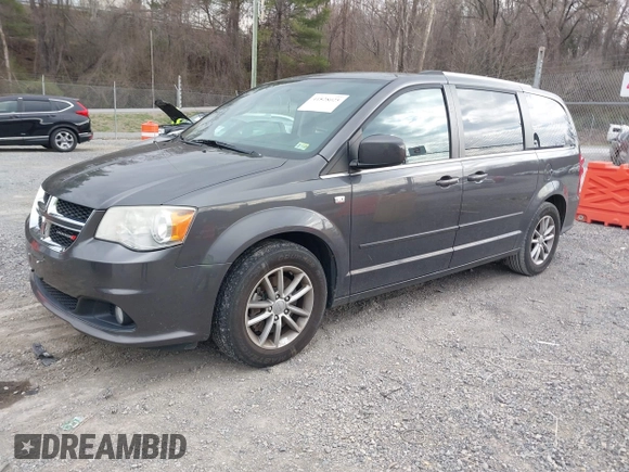 2014 Dodge Grand Caravan SXT with VIN 2C4RDGCG6ER376714, listed as a IAAI auction lot 41828025 with 172,285 mi miles and . Bid and sale history available at DreamBid. Image 17.