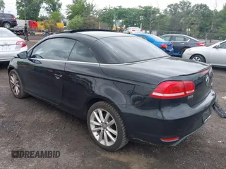 2014 Volkswagen Eos Sport with VIN WVWBW8AH2EV003356, listed as a IAAI auction lot 42394312 with 70,448 mi miles and . Bid and sale history available at DreamBid. Image 3.