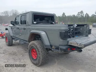 2021 Jeep Gladiator Rubicon with VIN 1C6JJTBG7ML554354, listed as a IAAI auction lot 41796943 with 61,513 mi miles and . Bid and sale history available at DreamBid. Image 3.