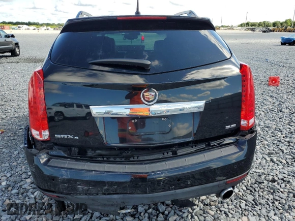 2013 Cadillac SRX Performance Collection with VIN 3GYFNHE37DS649235, listed as a Copart auction lot 56939285 with 104,692 mi miles and Salvage title. Bid and sale history available at DreamBid. Image 6.