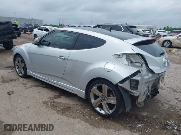 2013 Hyundai Veloster Turbo z VIN KMHTC6AE2DU122273, wystawiony jako IAAI lot #42174272 z przebiegiem 157 152 mil mil oraz . Historia ofert i sprzedaży dostępna na DreamBid. Obrazek 3.
