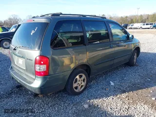 2000 Mazda MPV DX with VIN JM3LW28G0Y0154963, listed as a IAAI auction lot 41446402 with 219,262 mi miles. Bid and sale history available at carsss.com. Image 4.