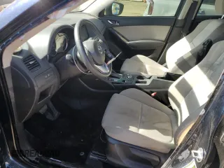 2016 Mazda CX-5 Sport with VIN JM3KE4BY4G0734582, listed as a Copart auction lot 55908515 with 52,323 mi miles and Salvage title. Bid and sale history available at DreamBid. Image 7.