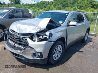 2019 Chevrolet Traverse LT Cloth z VIN 1GNERGKW3KJ293483, wystawiony jako IAAI lot #42524003 z przebiegiem 82 611 mil mil oraz . Historia ofert i sprzedaży dostępna na DreamBid. Obrazek 17.