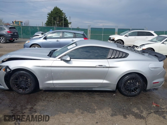 2015 Ford Mustang V6 with VIN 1FA6P8AM3F5348012, listed as a IAAI auction lot 41910661 with 144,584 mi miles and . Bid and sale history available at DreamBid. Image 14.