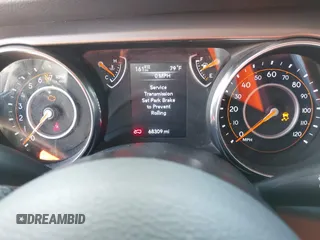 2019 Jeep Wrangler Unlimited Sport S with VIN 1C4HJXDG0KW541940, listed as a IAAI auction lot 42100255 with 68,309 mi miles and . Bid and sale history available at DreamBid. Image 7.