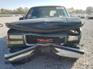 1997 GMC Suburban z VIN 3GKFK16R7VG514905, wystawiony jako Copart lot #77410934 z przebiegiem 193 116 mil mil oraz Szkoda całkowita • Salvage title. Historia ofert i sprzedaży dostępna na DreamBid. Obrazek 5.
