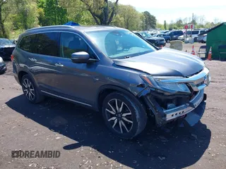 2021 Honda Pilot Touring 8-Passenger z VIN 5FNYF6H9XMB059037, wystawiony jako IAAI lot #42202410 z przebiegiem 49 267 mil mil oraz . Historia ofert i sprzedaży dostępna na DreamBid. Obrazek 1.