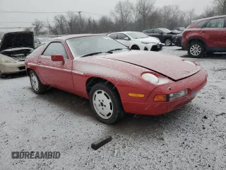 1987 Porsche 928 z VIN WP0JB0926HS860519, wystawiony jako Copart lot #84757504 z przebiegiem 64 737 mil mil oraz Szkody całkowita. Historia ofert i sprzedaży dostępna na DreamBid. Obrazek 4.