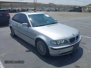 2002 BMW 3 Series 325i with VIN WBAET37452NG73105, listed as a IAAI auction lot 42105774 with 202,852 mi miles. Bid and sale history available at carsss.com. Image 1.