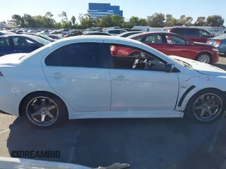 2012 Mitsubishi Lancer Evolution MR with VIN JA32W5FV3CU009679, listed as a IAAI auction lot 40787549 with 167,206 mi miles. Bid and sale history available at carsss.com. Image 14.